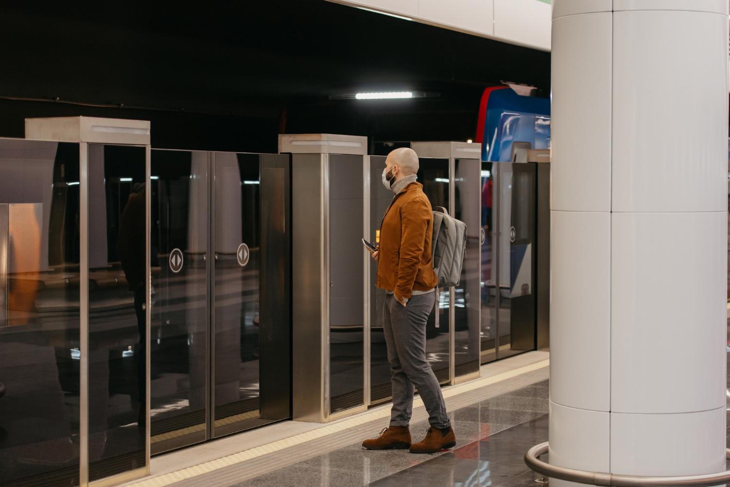 Facinos Walk and Pay: passenger approaches metro or transit gate for ticketless fare approval